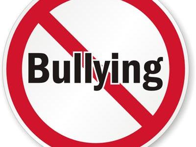 Imagem mostra simbolo de proibição ao bullying 